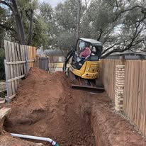 Residential plumber using excavator in North Texas. Wichita Falls, Holiday, Iowa Park plumbing company